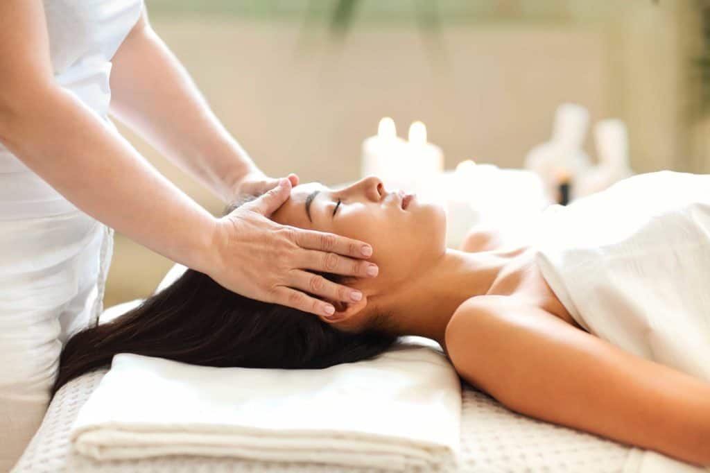 asian woman resting during spa procedure woman spa relax salon session eyes closed lying client t20 6YVzxY